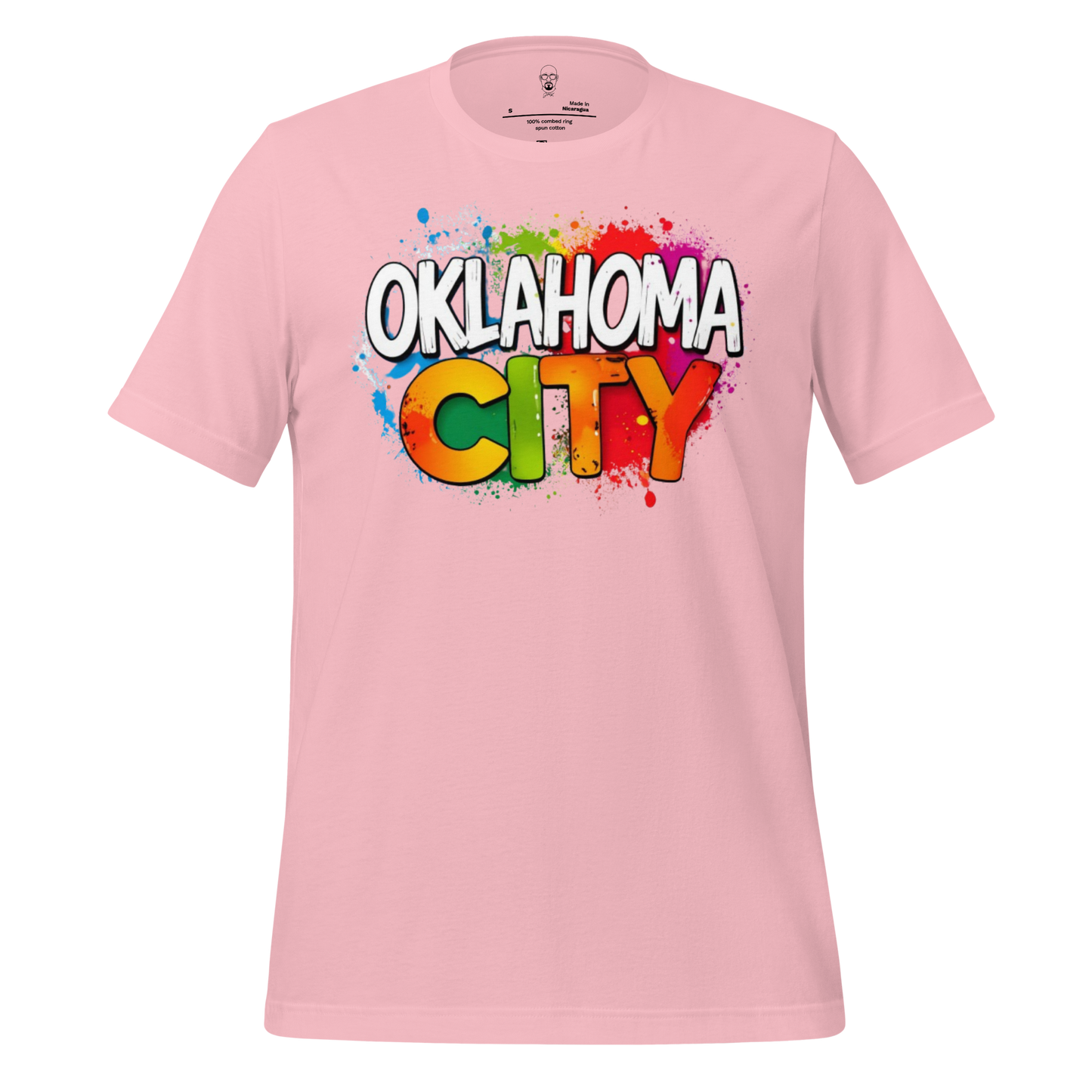 Pink Oklahoma City t-shirt with colorful splash design and bold white and multicolor text