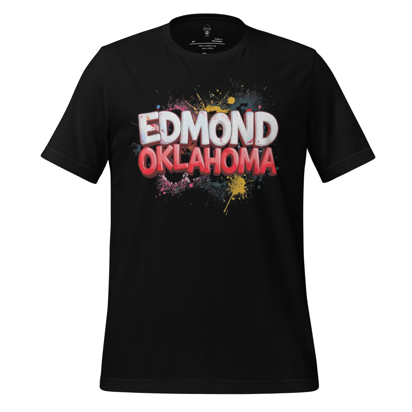 Black t-shirt with colorful paint splatter design and Edmond Oklahoma graphic tee text on front