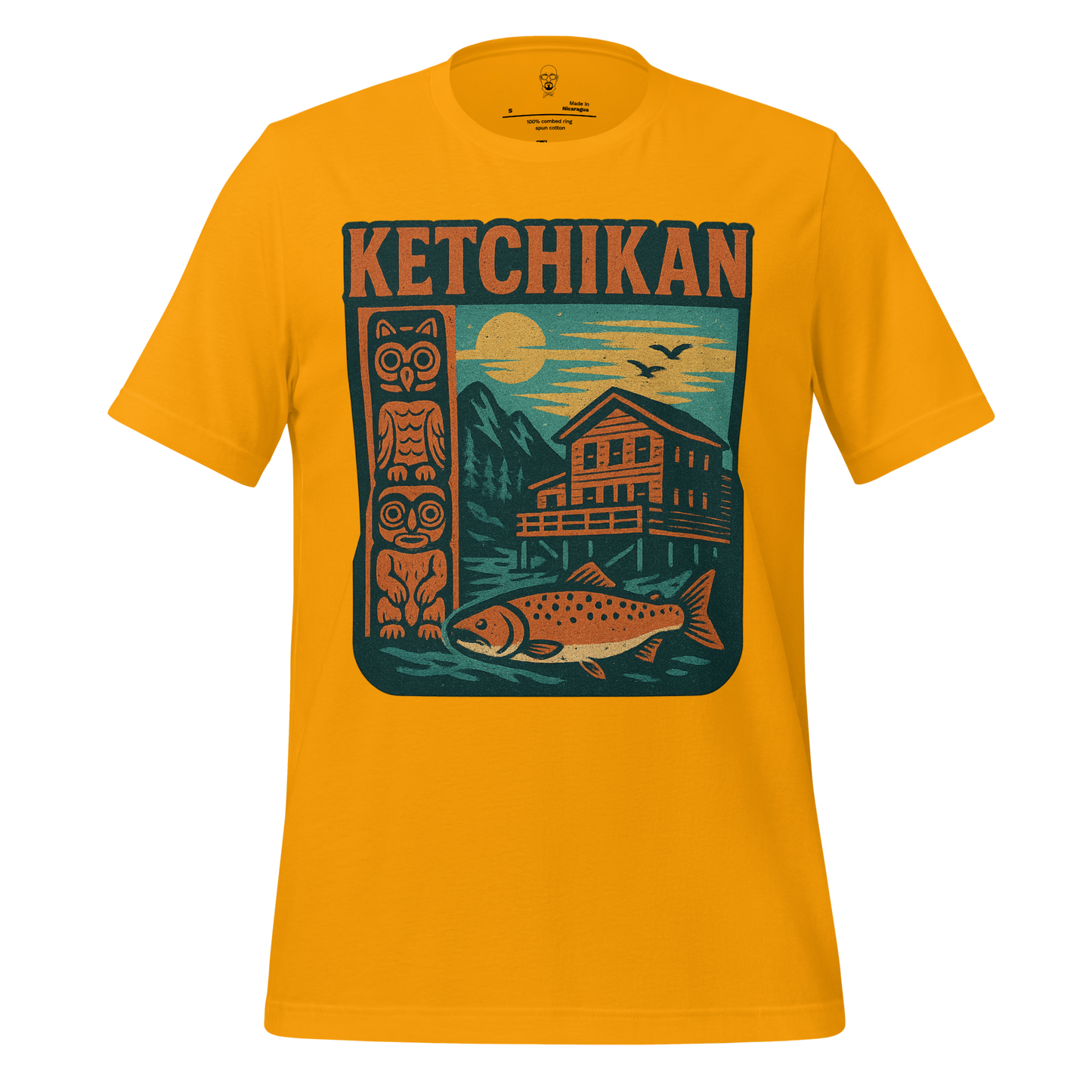 Yellow Ketchikan Graphic T-Shirt featuring a totem pole, fish, cabin, and mountain design