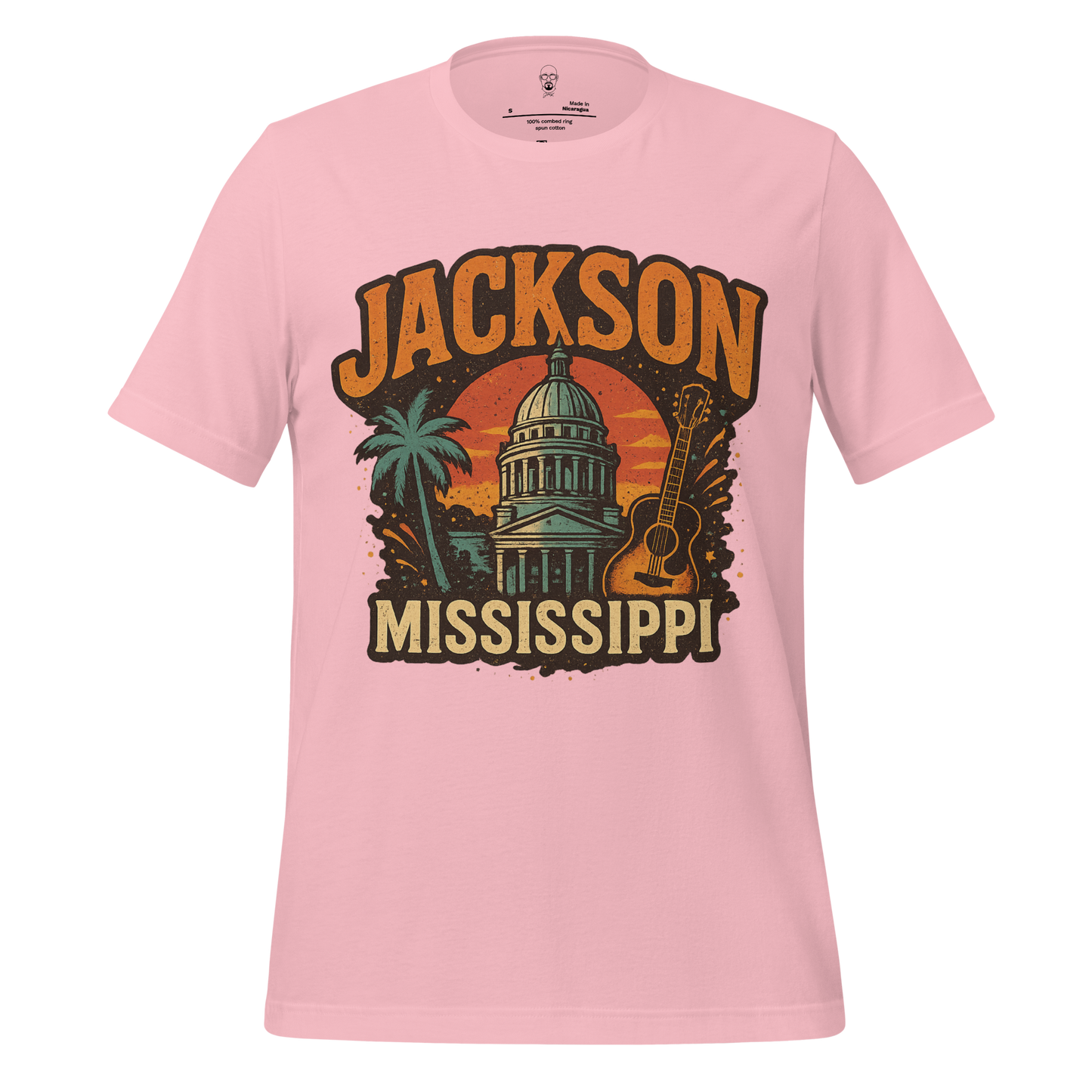JMK Drip pink Jackson Graphic T-Shirt with vintage Mississippi capitol building, palm tree, and guitar design