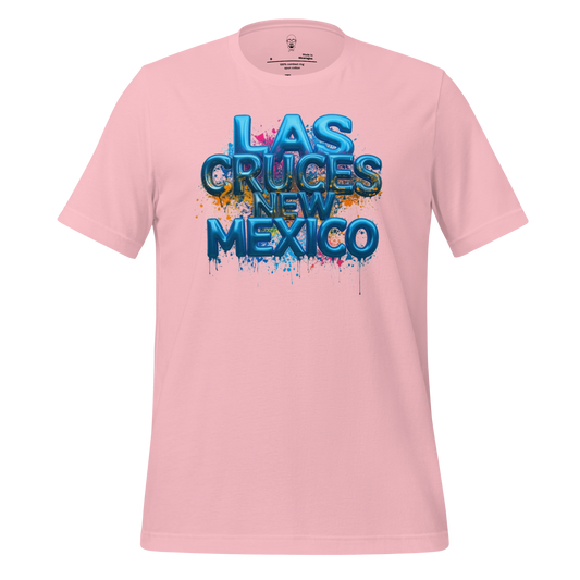 Pink Las Cruces t-shirt by JMK Drip with blue 3D text and paint splatter design