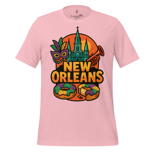 Pink New Orleans t-shirt with colorful Mardi Gras mask, trumpet, cathedral, and king cake design