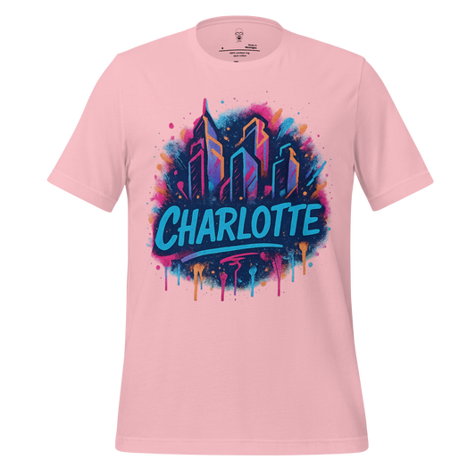 JMK Drip pink Charlotte graphic t-shirt featuring colorful city skyline and bold text design