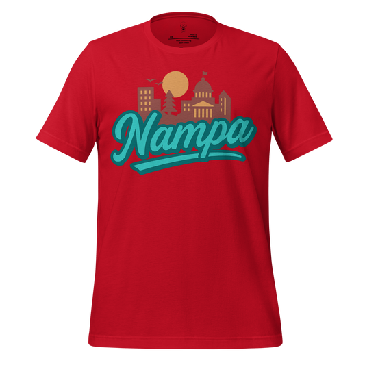 Red JMK Drip Nampa Graphic T-Shirt with city skyline and sun design in teal and gold